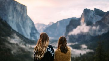 Two sisters standing together